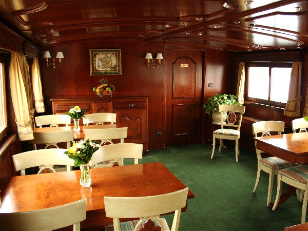 The dining room aboard the Nenuphar offers plenty of room for privacy and intimate conversation