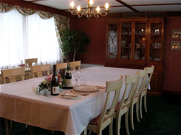 The dining room is beautifully set for all of your meals